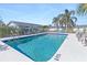 Inviting community swimming pool with ample seating at 1956 Wyoming Ave # 0, Englewood, FL 34224