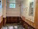 Bathroom under renovation, featuring a window and tiled walls at 227 Harvey St, Punta Gorda, FL 33950