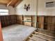 Bedroom under renovation with exposed wooden framing at 227 Harvey St, Punta Gorda, FL 33950