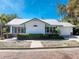 Charming one-story home with a metal roof and brick accents at 227 Harvey St, Punta Gorda, FL 33950