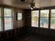 Room with damaged walls and floors, needs renovation at 227 Harvey St, Punta Gorda, FL 33950