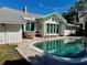 View of the pool from the patio, showcasing the brickwork at 227 Harvey St, Punta Gorda, FL 33950