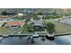 Aerial view of waterfront property with private dock and canal access at 2358 El Cerito Ct, Punta Gorda, FL 33950