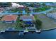 Property overview showcasing a canal-front home, pool, and dock at 2358 El Cerito Ct, Punta Gorda, FL 33950