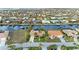 Aerial view showcasing the home's location on a canal in a residential area at 2358 El Cerito Ct, Punta Gorda, FL 33950