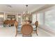 Bright dining area featuring a glass-top table and stylish chairs at 2358 El Cerito Ct, Punta Gorda, FL 33950