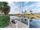 Private dock with seating, offering stunning canal views at 2358 El Cerito Ct, Punta Gorda, FL 33950