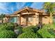 Inviting front entrance with a covered entryway and lush landscaping at 2358 El Cerito Ct, Punta Gorda, FL 33950