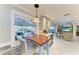 Breakfast nook in kitchen with wood top table and view of pool at 2358 El Cerito Ct, Punta Gorda, FL 33950