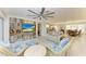 Bright living area with ample seating and a view into the dining area at 2358 El Cerito Ct, Punta Gorda, FL 33950