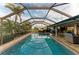 Enclosed pool and patio area with a view at 2358 El Cerito Ct, Punta Gorda, FL 33950