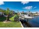 Private boat dock on a tranquil canal with garden at 2748 Saint Thomas Dr, Punta Gorda, FL 33950