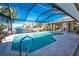 Inviting screened pool with canal views at 2748 Saint Thomas Dr, Punta Gorda, FL 33950