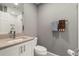Small bathroom with single vanity and updated fixtures at 2871 Coral Way, Punta Gorda, FL 33950