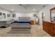 Spacious bedroom with king-size bed and wood furniture at 2871 Coral Way, Punta Gorda, FL 33950