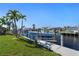 Convenient boat dock with lift and canal access at 2871 Coral Way, Punta Gorda, FL 33950