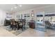 Bright dining area with table and chairs, access to patio at 2871 Coral Way, Punta Gorda, FL 33950