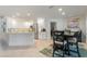 Modern kitchen with white cabinets, stainless steel appliances, and an island at 2871 Coral Way, Punta Gorda, FL 33950