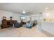 Open concept living space with tile floors, comfy seating and kitchen views at 2871 Coral Way, Punta Gorda, FL 33950