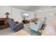 Relaxing living room with comfortable seating and a large TV at 2871 Coral Way, Punta Gorda, FL 33950