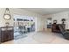 Living area with sliding doors revealing a view to the pool and patio at 2871 Coral Way, Punta Gorda, FL 33950