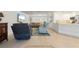 Open concept living and kitchen area with tile flooring at 2871 Coral Way, Punta Gorda, FL 33950