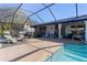 Enclosed pool and spa area with ample deck space at 2871 Coral Way, Punta Gorda, FL 33950