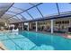 Large screened-in pool with plenty of space for lounging at 2871 Coral Way, Punta Gorda, FL 33950