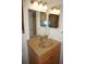 Bathroom vanity with sink and mirror at 311 Garvin St # 409D, Punta Gorda, FL 33950