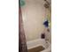 Clean bathroom with shower and tiled walls at 311 Garvin St # 409D, Punta Gorda, FL 33950