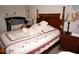 Bedroom with crib and wooden bed frame at 311 Garvin St # 409D, Punta Gorda, FL 33950