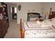 Bedroom with crib and wooden bed frame at 311 Garvin St # 409D, Punta Gorda, FL 33950