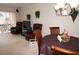 Dining area with wood table and chairs, near living room at 311 Garvin St # 409D, Punta Gorda, FL 33950