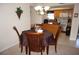 Dining area with wood table and chairs near kitchen at 311 Garvin St # 409D, Punta Gorda, FL 33950