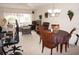 Living room with dining table and access to balcony at 311 Garvin St # 409D, Punta Gorda, FL 33950