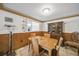 Bright dining room featuring a wood table and hutch at 3360 Conway Blvd, Port Charlotte, FL 33952