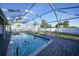 Inviting screened pool with ample deck space at 3360 Conway Blvd, Port Charlotte, FL 33952