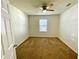 Bright bedroom with carpeted floor and ceiling fan at 3924 Candia Ave, North Port, FL 34286