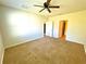 Large bedroom featuring carpet flooring and ceiling fan at 3924 Candia Ave, North Port, FL 34286