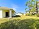 House exterior showing backyard and additional structure at 3924 Candia Ave, North Port, FL 34286