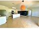 Modern kitchen features island, stainless steel appliances, and breakfast bar at 3924 Candia Ave, North Port, FL 34286