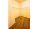 Spacious walk-in closet with wire shelving and carpeted flooring at 3924 Candia Ave, North Port, FL 34286