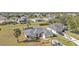 Aerial view of house, landscaping and neighborhood at 413 San Ambrosio St, Punta Gorda, FL 33983