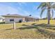 House with pool and backyard, featuring a grassy area at 413 San Ambrosio St, Punta Gorda, FL 33983