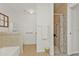 Bathroom with shower, grab bars, and linen closet at 413 San Ambrosio St, Punta Gorda, FL 33983