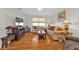 Living room with hardwood floors, neutral colors, and comfortable seating at 413 San Ambrosio St, Punta Gorda, FL 33983