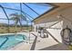 Pool area with shower and grilling station at 413 San Ambrosio St, Punta Gorda, FL 33983