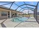 Screened pool with patio and backyard view at 413 San Ambrosio St, Punta Gorda, FL 33983