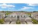 Aerial view of three-unit townhome building at 43306 Water Bird Way # 6622, Punta Gorda, FL 33982