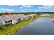 Aerial view of townhome community by the lake at 43306 Water Bird Way # 6622, Punta Gorda, FL 33982